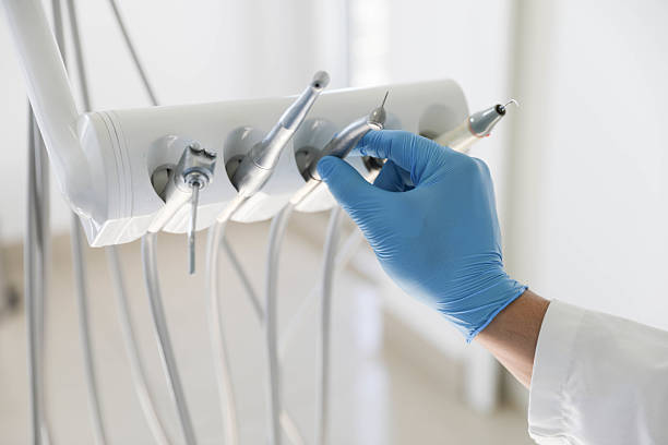 Professional Tooth Extraction technician working in Augusta, WI